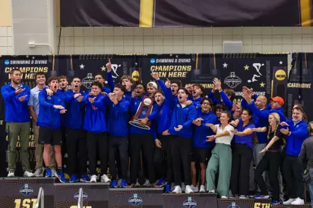 2026 Florida Men Swim & Dive Team with their second-place trophy at the 2026 Division I Men's Swimming & Diving Championships on March 28, 2026 at the McAuley Aquatics Center in Atlanta, Ga.