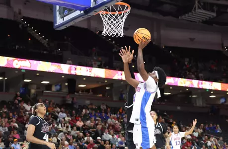 Alexia Dizeko scores against Mississippi State in the first round of the SEC Tournament