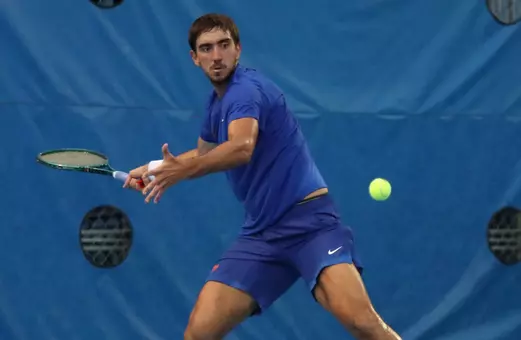 Lorenzo Claverie hitting forehand in singles against Texas A&M.