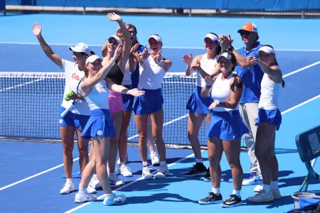 The Florida Women's Tennis Team waves goodbye to the fan for the last time during the 2026 regular season