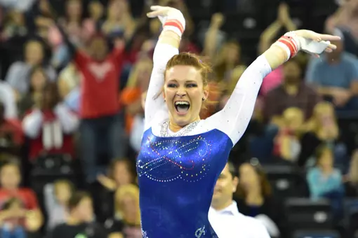 Bridget Sloan celebrates her 10.0 uneven bars routine at the 2015 SEC Championships