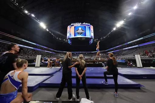 Gators head coach Jenny Rowland watches her team practice on Wednesday, April 15, at Dickies Arena in Fort Worth, Texas.