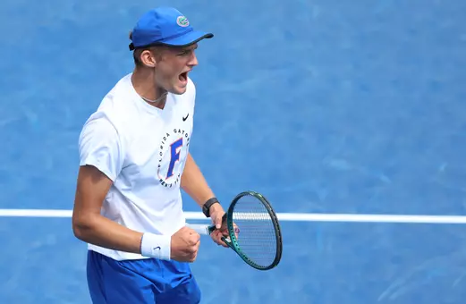 Henry Jefferson celebrating a point on court by screaming to hype up his team.