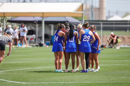 Florida's Offense Huddles After A Goal
