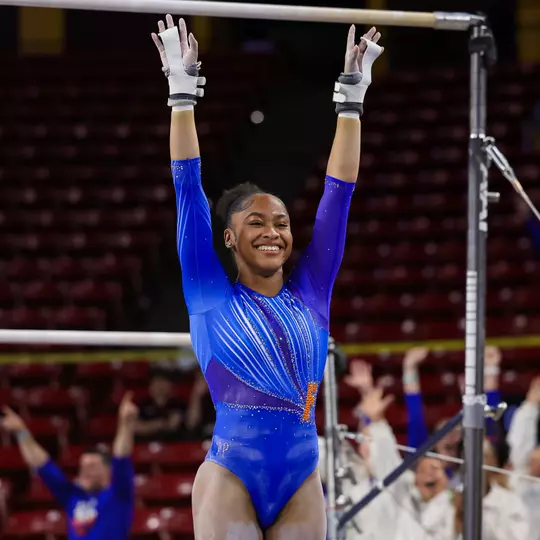 Skye Blakely salutes after her 10.0 uneven bars routine at NCAA Tempe Regional 260402