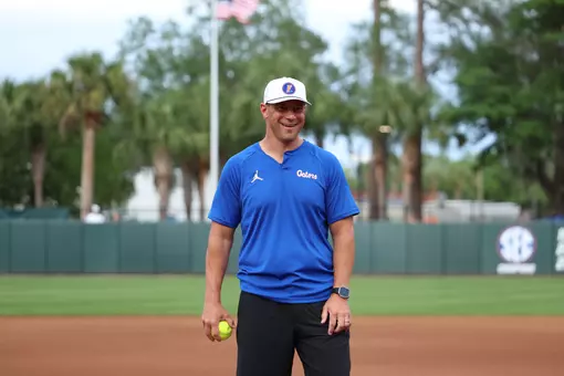 Florida football head coach Jon Sumrall throws the first pitch before the Gators' game against the Knights on Friday, April 24, 2026 at Katie Seashole Pressly Softball Stadium in Gainesville, FL / UAA Communications photo by Audrey Djuricich