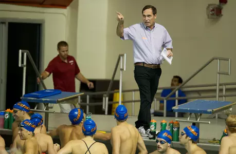 Former head coach of Florida Swimming and Diving Gregg Troy addressing the team at the meet against Alabama in the 2013-14 season.