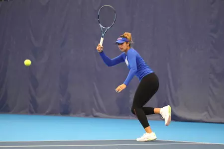 Scarlett Nicholson warming up prior to the team's First Round NCAA match vs. Toledo