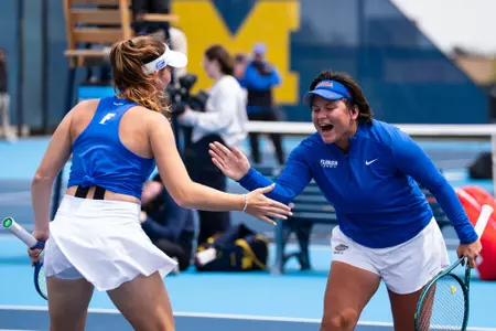 Brooke Black and Valery Gynina High Five at Michigan (NCAA Second Round)
