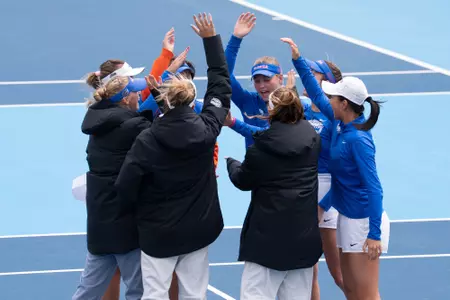 Team huddle prior to NCAA Second Round Match at Michigan