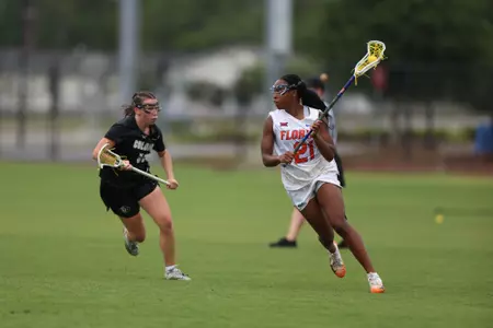 Clark Hamilton (No. 21) with the ball against Colorado