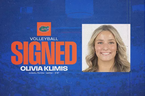 A female smiles in her head shot on a blue background with her name, Olivia Klimis