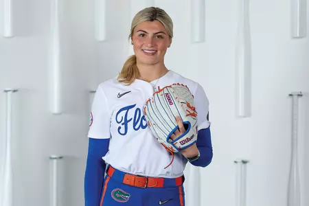 Caroline Stanton posing with a glove