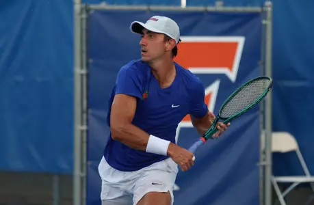 Lorenzo Claverie on his follow through from a forehand shot in a singles match.