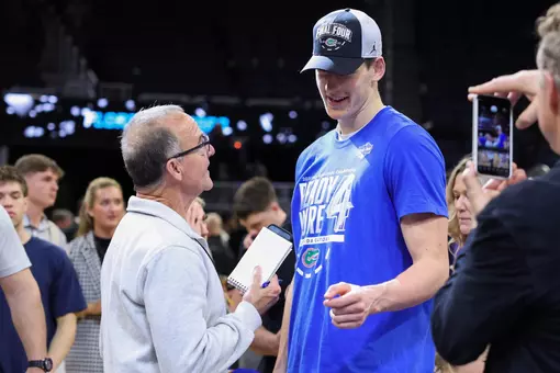 Chris Harry interviews Alex Condon in the midst of the postgame celebration following UF's Elite Eight win vs. Texas Tech.