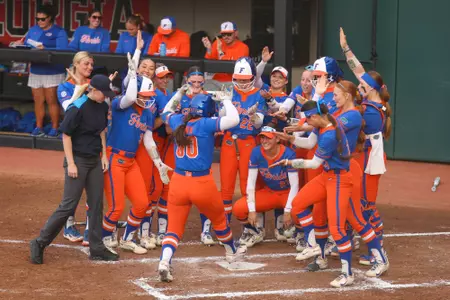 Ava Brown celebrates a HR vs. Georgia