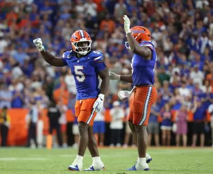 Myles Graham celebrates a stop during a game