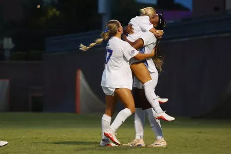 Lena Bailey celebrates her second goal versus Jacksonville with Sophia Sindelar and Emma Duval 260827