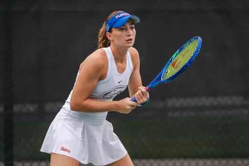 Women's Tennis player Brooke Black prepares to return serve at the ITA All-American Championships