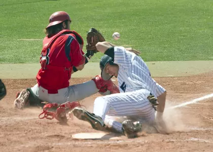 Joey Bristyan slides in safely for one of GCU's runs in an 8-4 victory over Hilo Saturday.