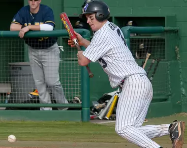 Tyler Bair continues his hot-hitting, extending his hitting streak to nine games and batting average to .417 in a doubleheader sweep of AAU Saturday.