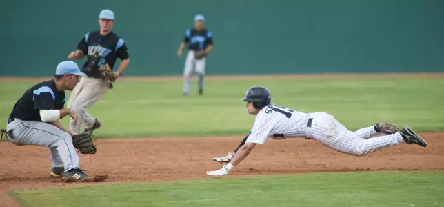 Trevor Santor steals the base.