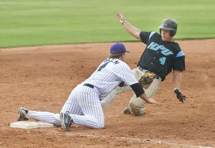 Jay Green is tagging number 4 for an out.