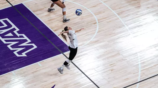 taylor serving during match against UVU