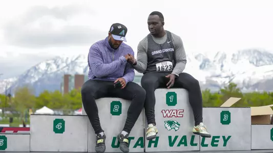 Okyere and Oloyede after going first-second in mens hammer