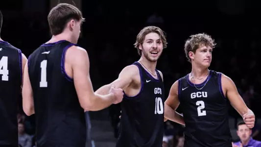 Herr Ottmar and Rogers celebrate