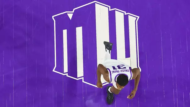 Mountain West logo on court