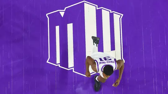 Mountain West logo on court