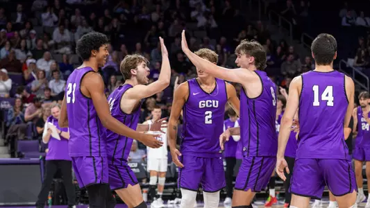 team celebration after defeating ucla