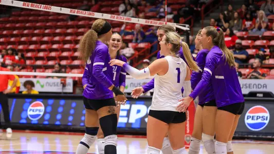 team celebrates after big point