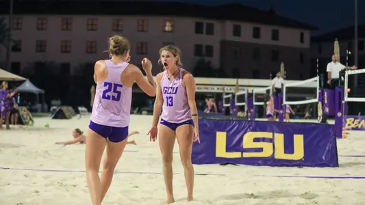 rhea and mae celebrating after win