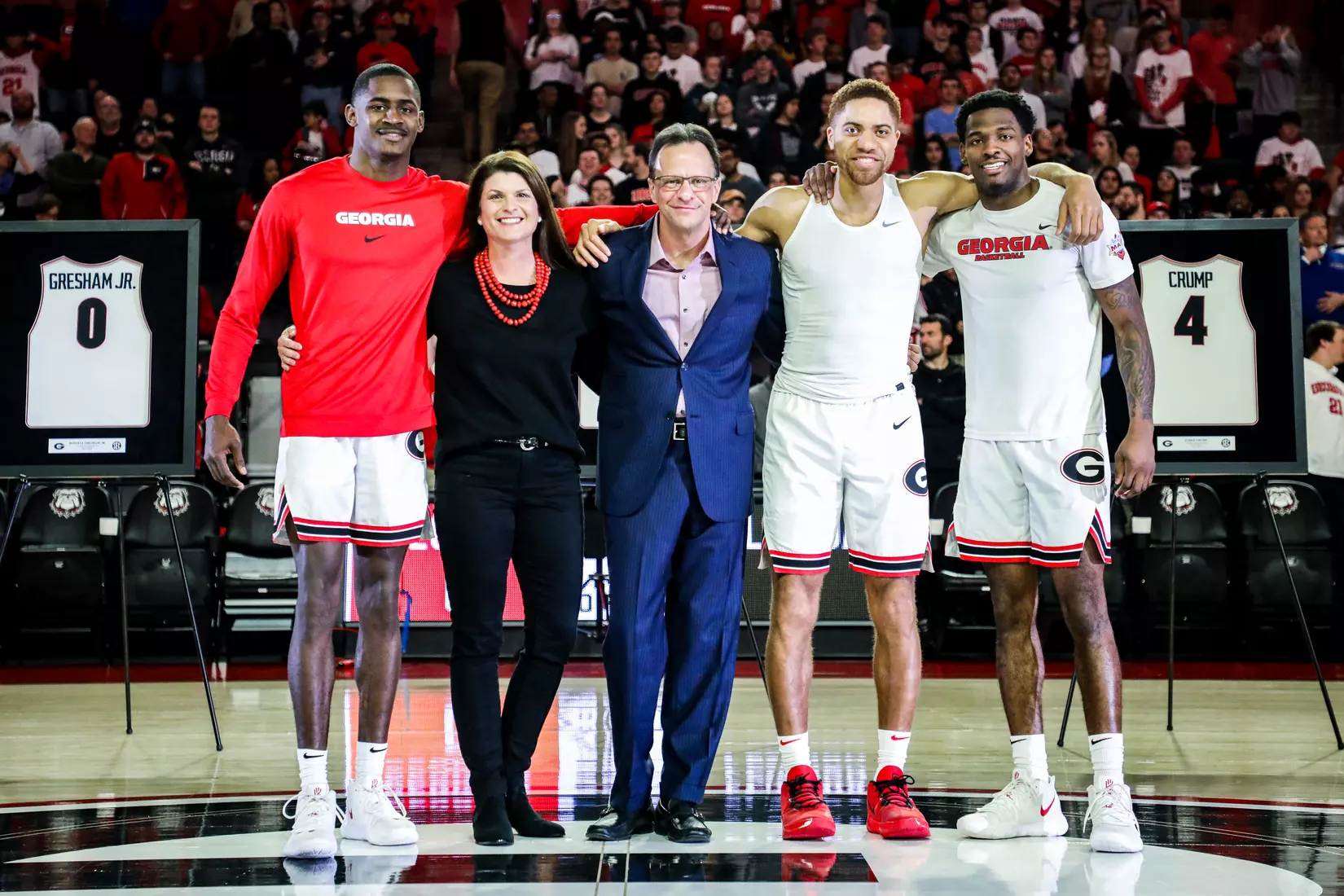 Georgia basketball player Jordan Harris (2), Georgia head coach Tom Crean, Georgia basketball player Donnell Gresham Jr. (0), Georgia basketball player Tyree Crump (4) during Georgia's senior night before a game against Florida at Stegeman Coliseum in Athens, Ga., on Wed., March 4, 2020. (Photo by Tony Walsh)
