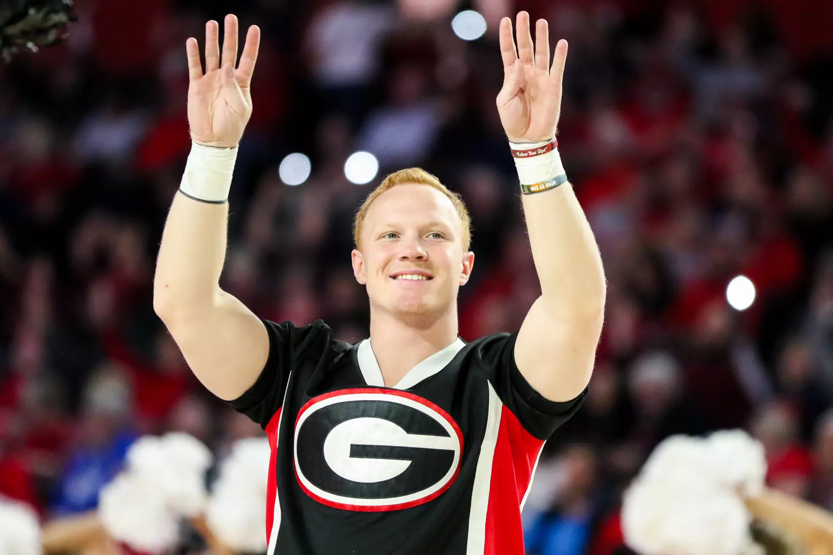 A cheerleader during a game against Texas A&M at Stegeman Coliseum in Athens, Ga., on Sat., Feb. 1, 2020. (Photo by Chamberlain Smith)