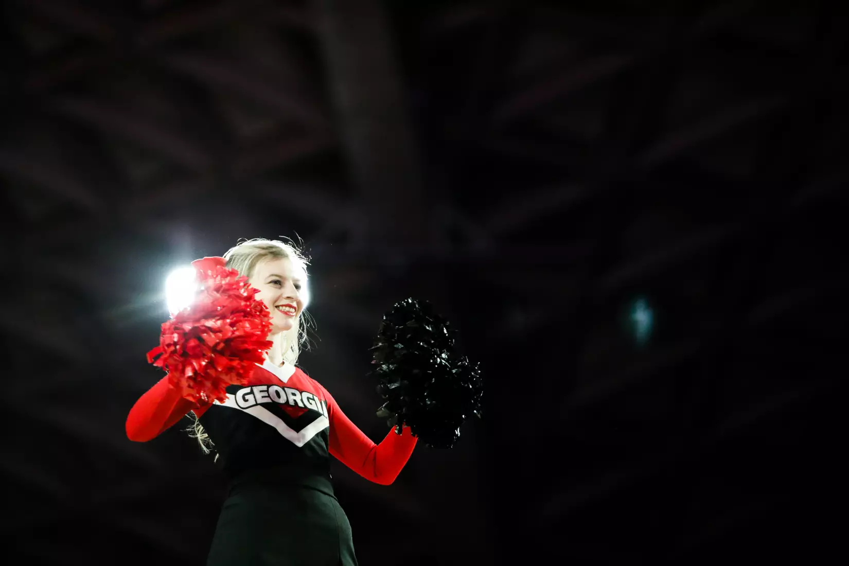 A cheerleader during a game against Arkansas at Stegeman Coliseum in Athens, Ga., on Sat., Feb. 29, 2020. (Photo by Chamberlain Smith)