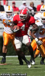 Caleb King rushes for yardage during the Bulldogs' game with Tennessee on Saturday in Athens. (Photo by Ashley Strickland)