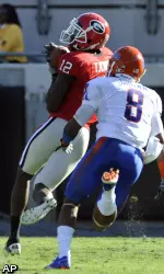 Georgia receiver Tavarres King (12) hauls in a touchdown pass against Florida cornerback Jeremy Brown (8)(AP Photo/Stephen Morton)