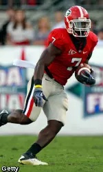 Orson Charles #7 of the Georgia Bulldogs runs for yardage Saturday. (Photo by Sam Greenwood/Getty Images)