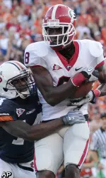 Georgia's A.J. Green (8) catches a 30-yard touchdown pass in the first half. (AP Photo/Dave Martin)