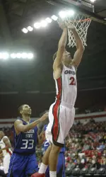 Connor Nolte scores for Georgia during the men's basketball exhibition game against Augusta State on Thursday night. (Photo by Ashley Strickland)