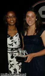 Kathleen Gates is presented with the UGA Lewis Leadership Award (2010), which is the highest recognition of UGA female athletes that embodies dedication, motivation, discipline and a positive attitude.