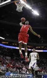 Mar 18, 2011; Charlotte, NC, USA; Georgia Bulldogs guard Travis Leslie (1) dunks during the game against the Washington Huskies during the second round of the 2011 NCAA men's basketball tournament at the Time Warner Cable Arena. Mandatory Credit: Andrew Synowiez-US PRESSWIRE