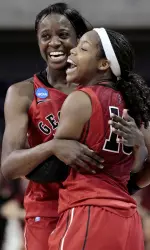 Georgia's Jasmine James, right, reacts with teammate Porsha Phillips, rear, after making the winning shot over Florida State in the second half of a second round NCAA women's college basketball tournament game at Auburn Arena in Auburn, Ala., Tuesday, March 22, 2011.