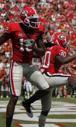 Tavarres King and Carlton Thomas celebrate one of Georgia's touchdowns.
