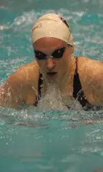 Melanie Margalis won the 100-yard breaststroke and helped the Lady Bulldogs win their 28th straight SEC meet.
