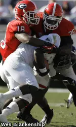 Safety Bacarri Rambo (18) and linebacker Michael Gilliard (35)