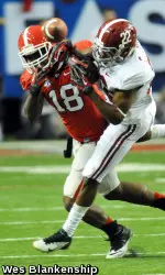 Safety Bacarri Rambo (18) knocks the ball away from Alabama's Christion Jones